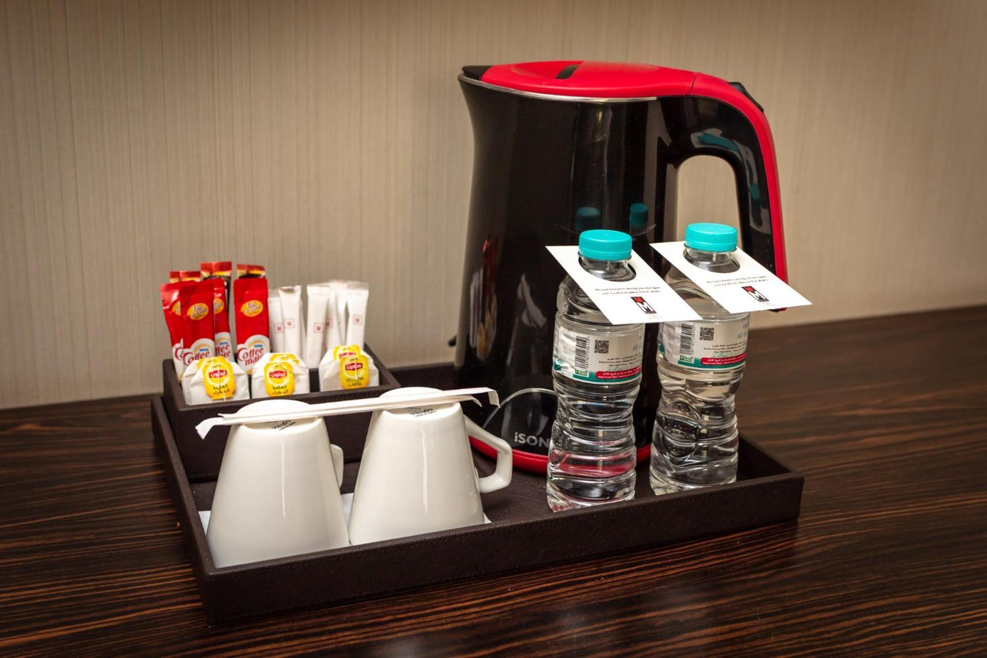 M Hotel Makkah By Millennium Mecca Exterior photo A tray of room service